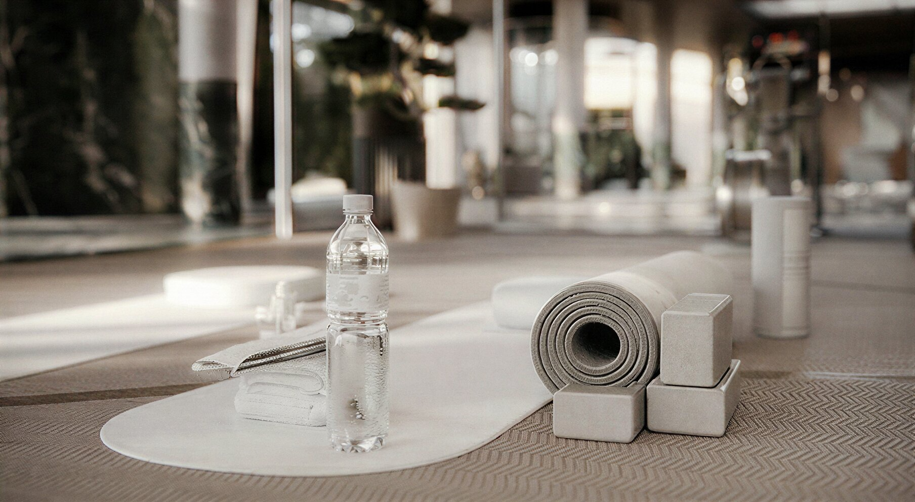 Yoga mat and water bottle in the gym, Pool and Gym project — luxury interior design Dubai