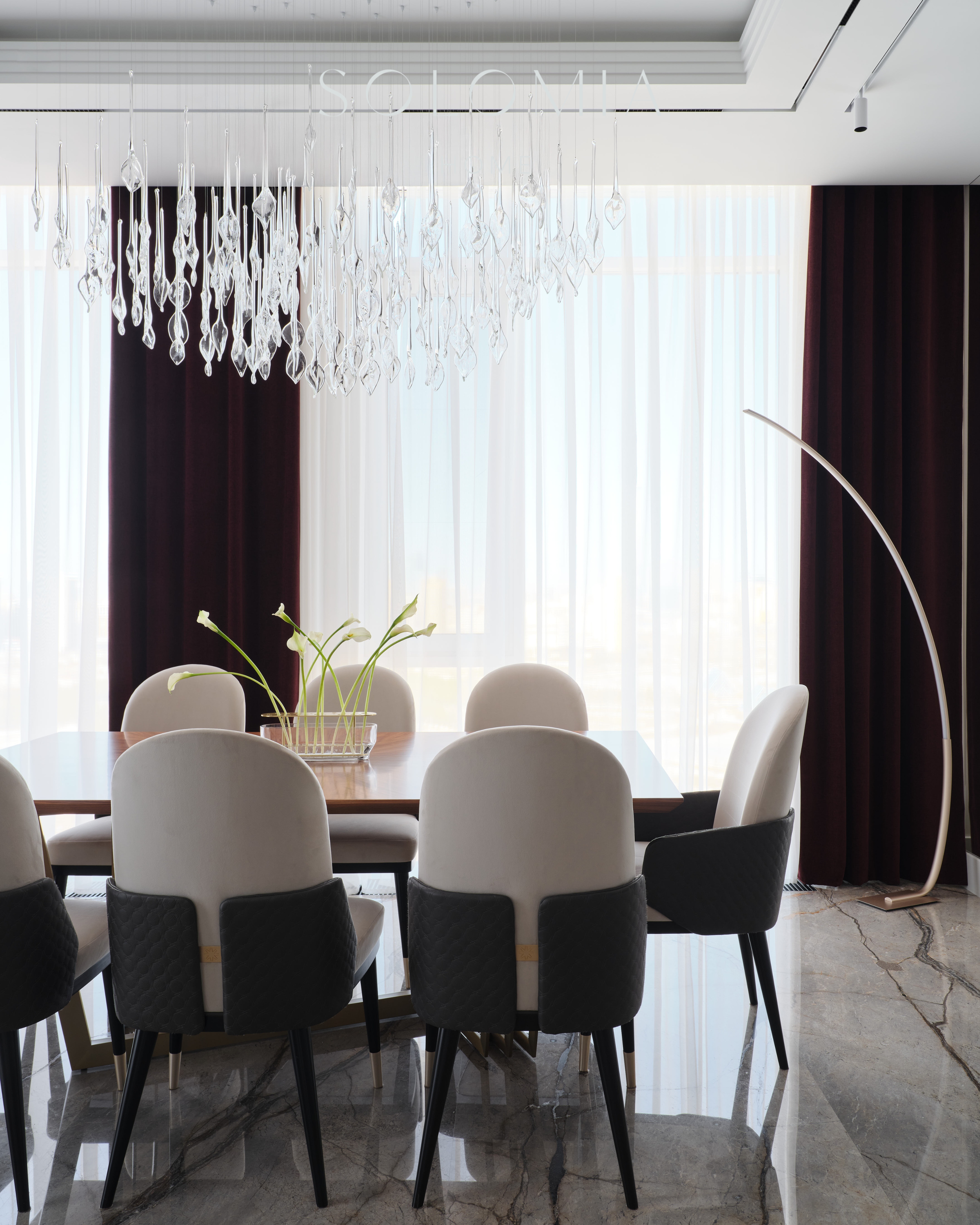 Dining chairs under a crystal chandelier, Apartment in Botanical Residence — luxury interior design Astana