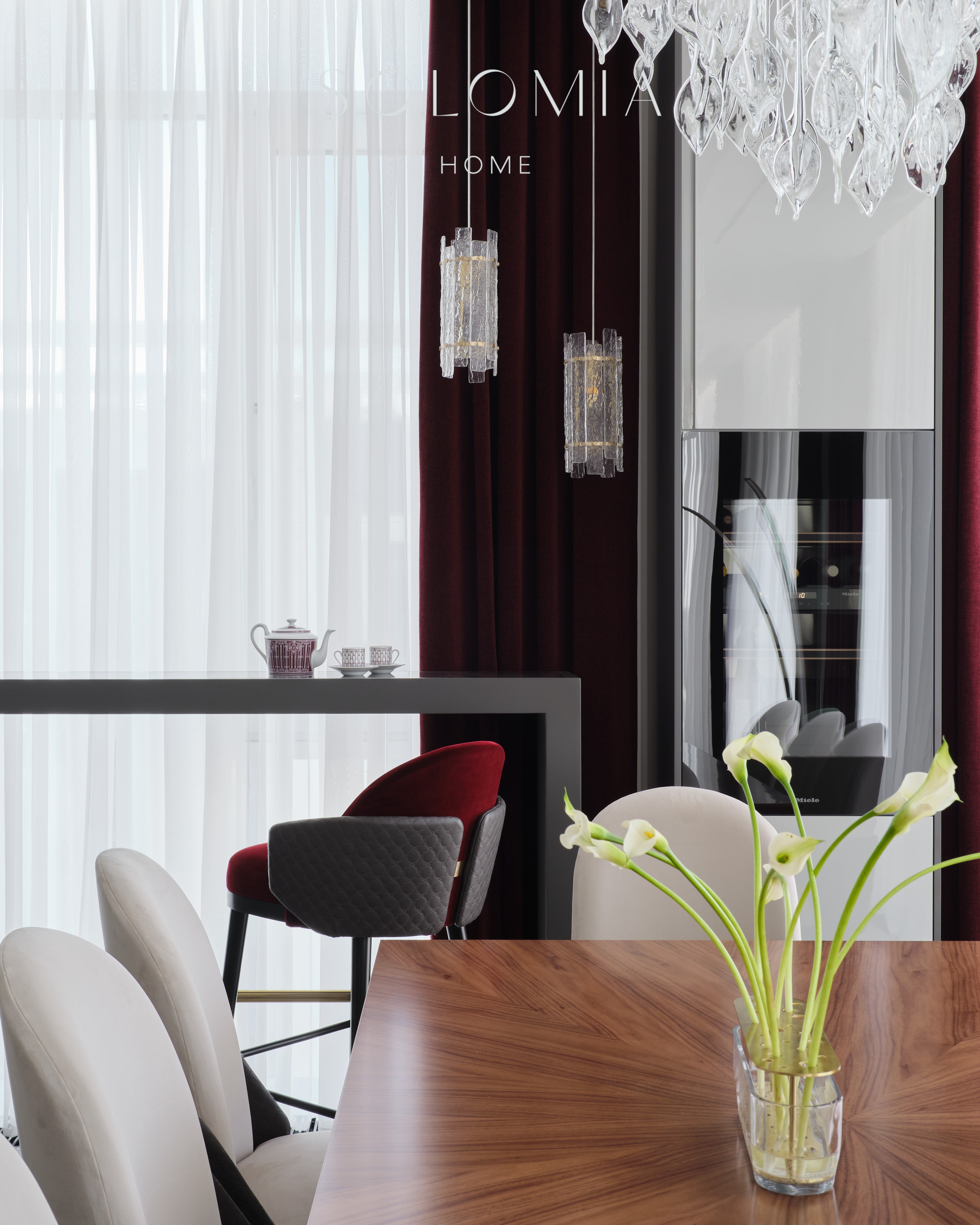 Dining table with white chairs and calla lilies, Apartment in Botanical Residence — luxury interior design Astana