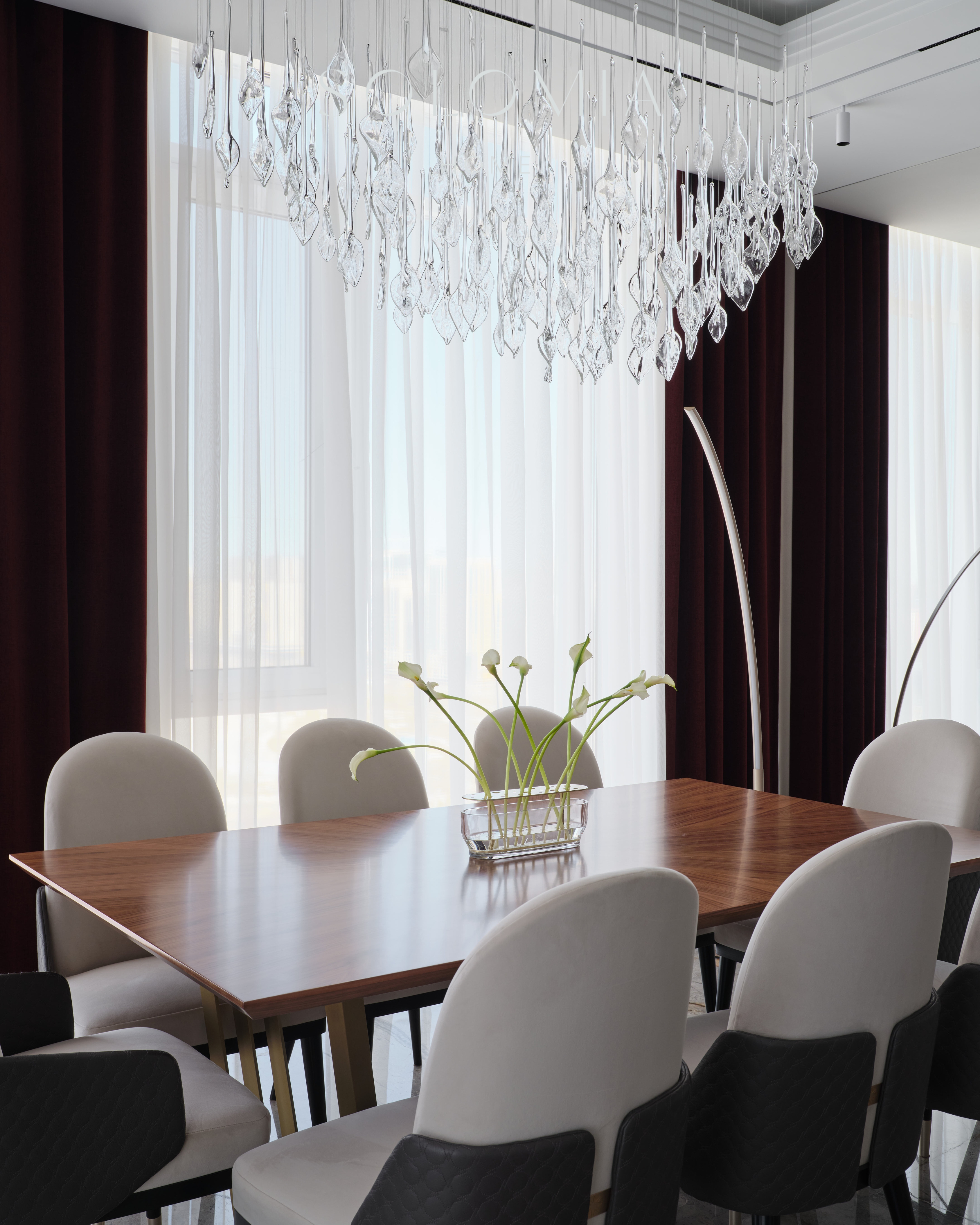 Dining area with crystal chandelier, Apartment in Botanical Residence — luxury interior design Astana