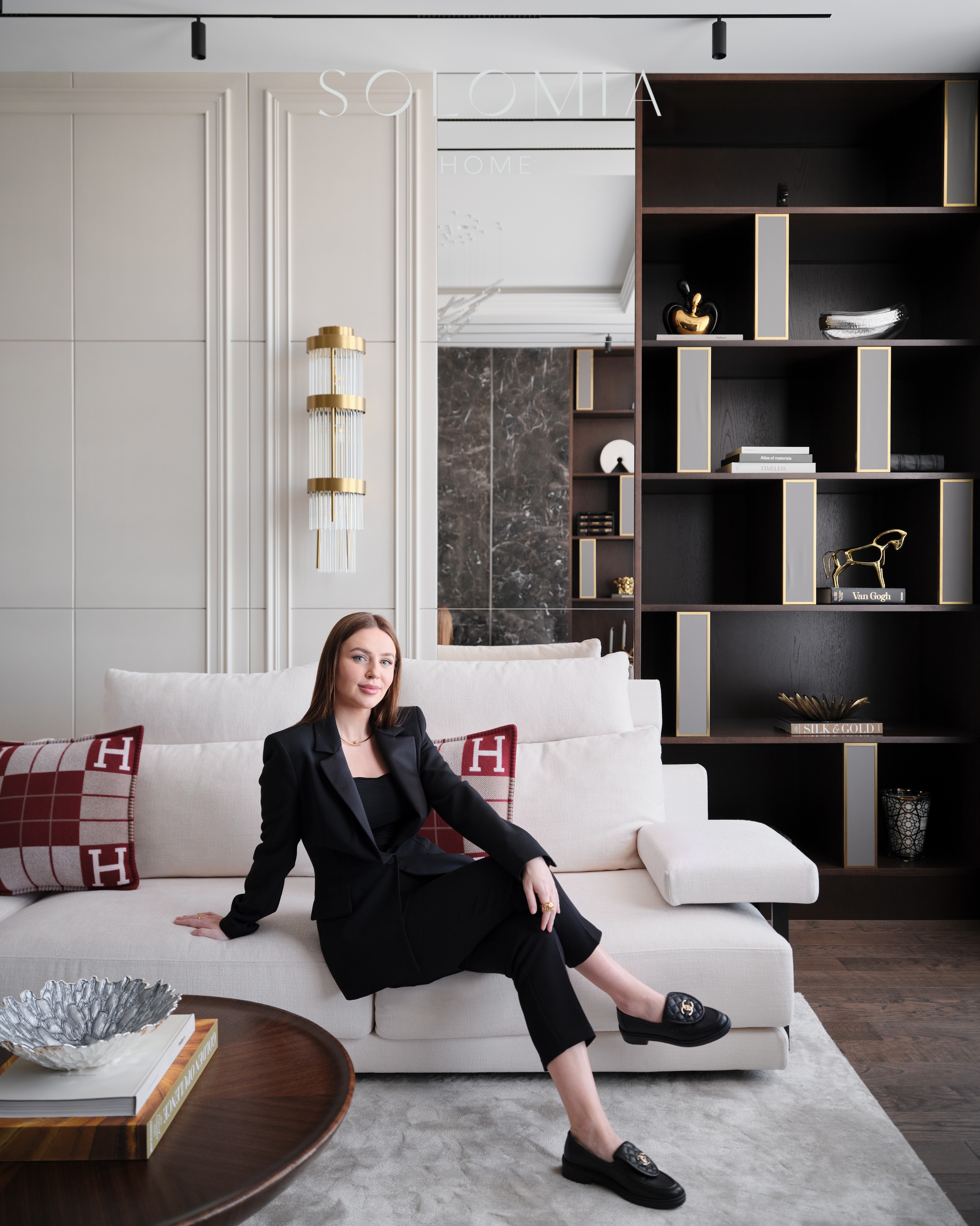 Solomia Design designer on the sofa — interior design company in Dubai