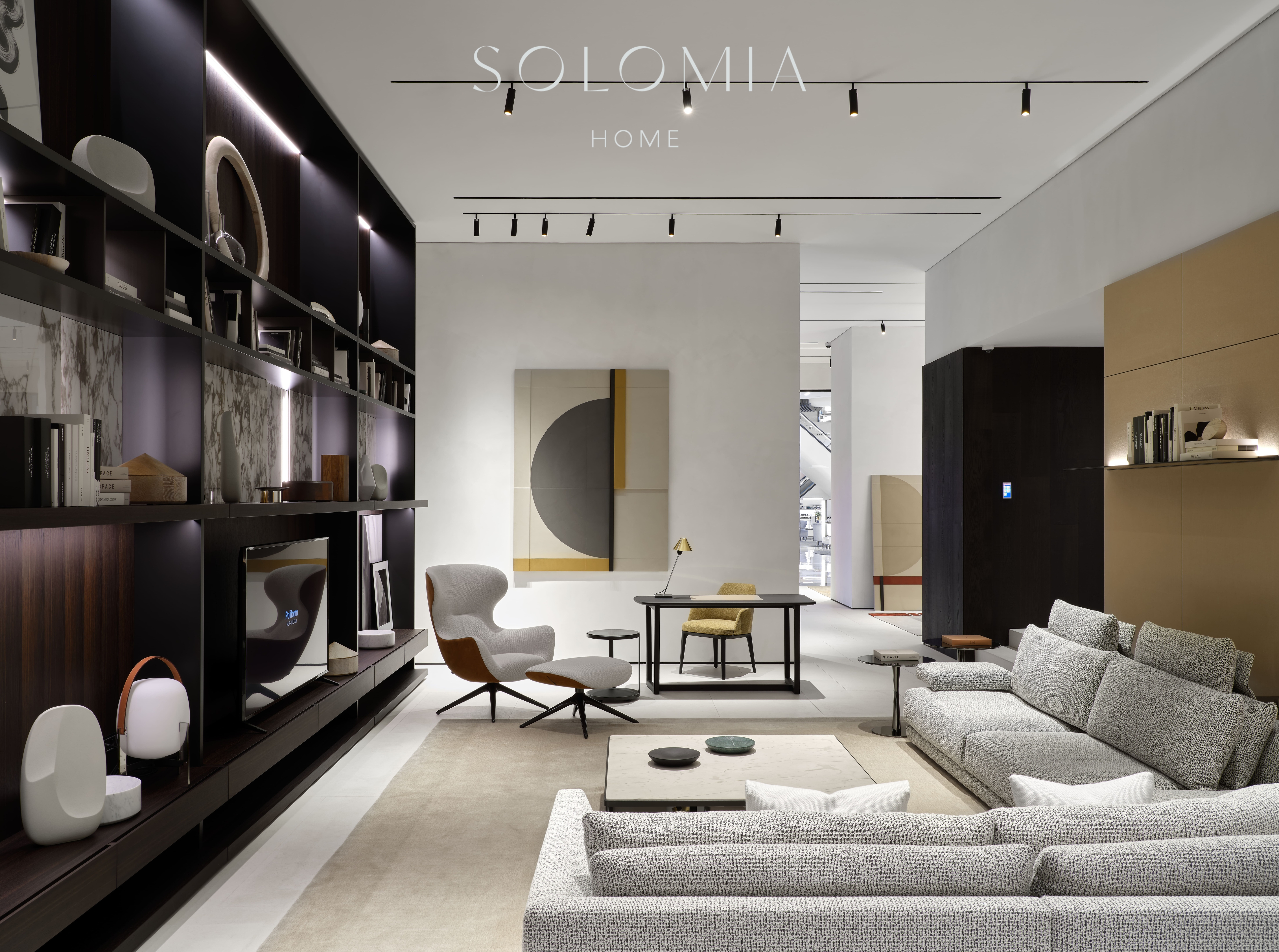 Showroom living area with grey sofa, Poliform Project — showroom interior design Astana