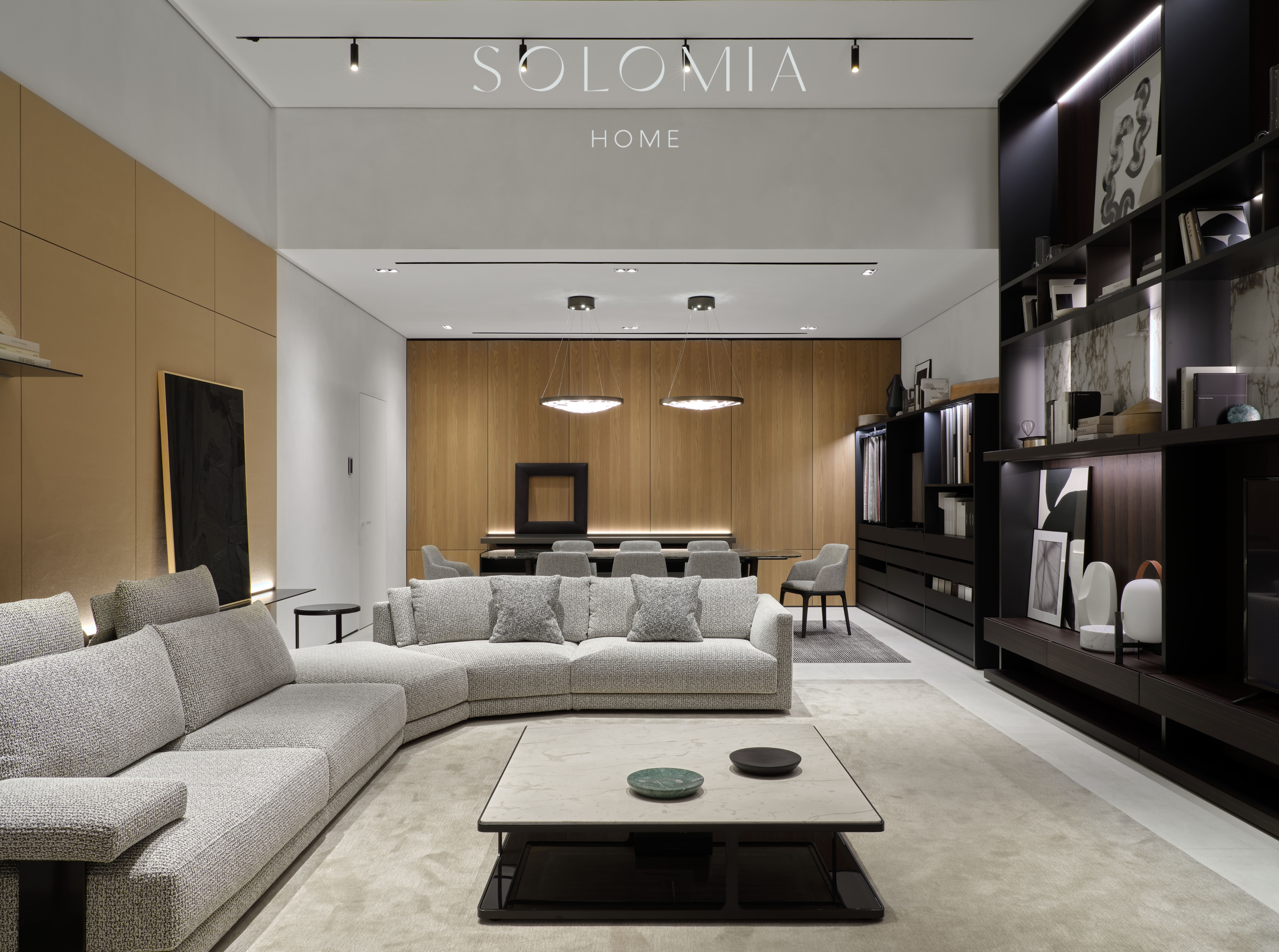 Living room with grey sofa and shelving, Poliform Project — showroom interior design Astana