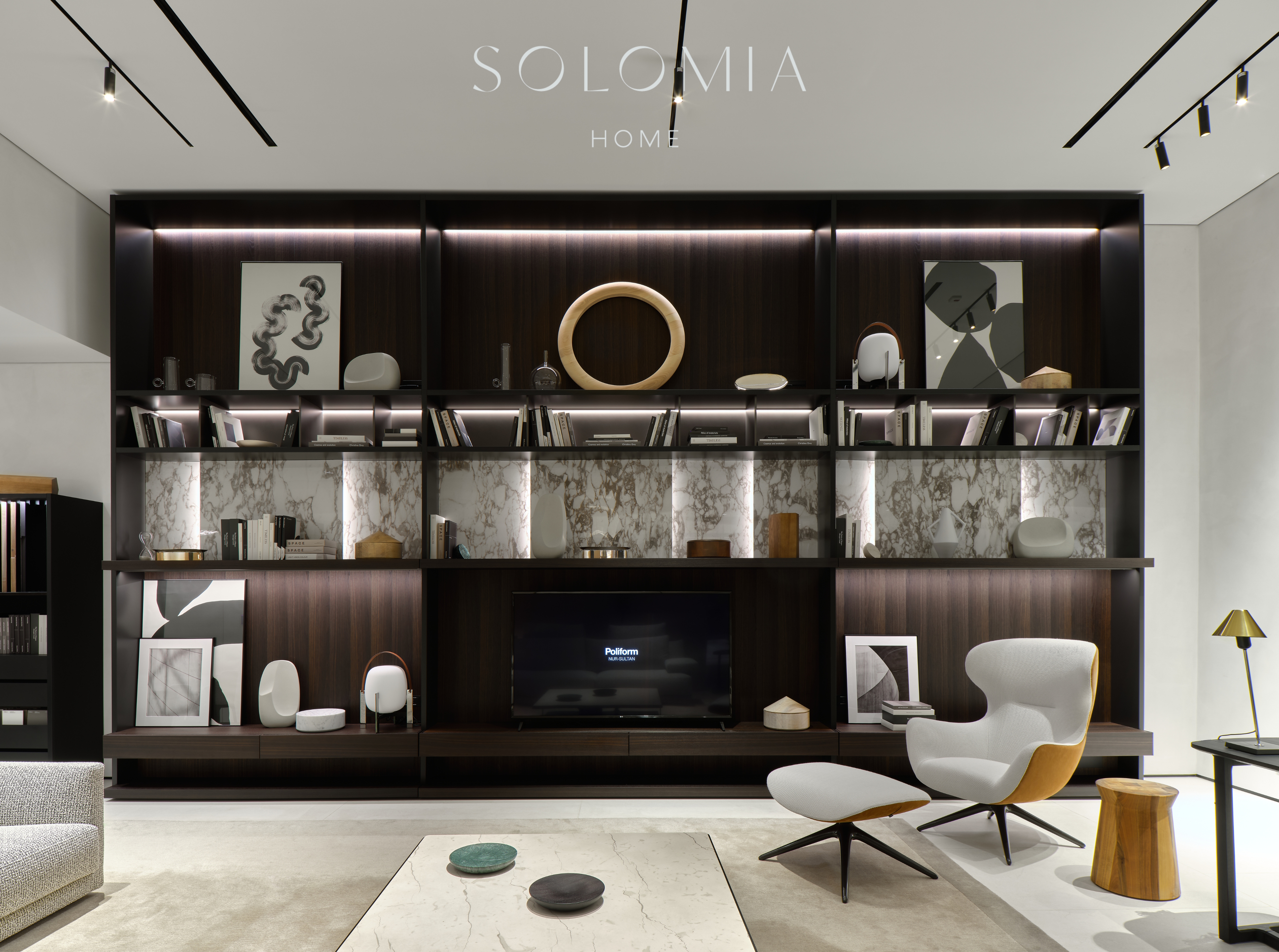 Lounge with TV shelving and armchair, Poliform Project — showroom interior design Astana
