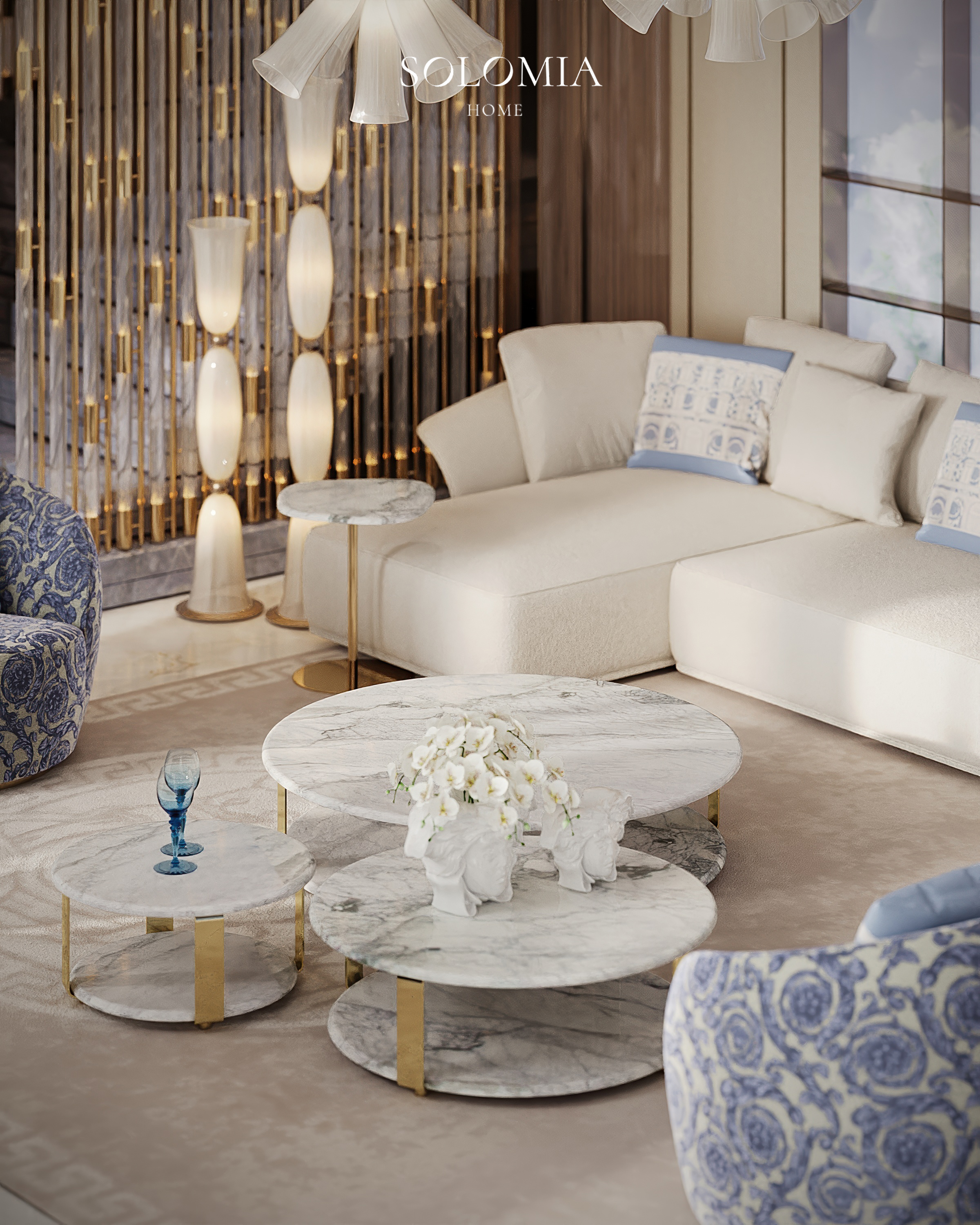 White sofa with marble tables and blue armchair, Versace Villa — luxury interior design Dubai