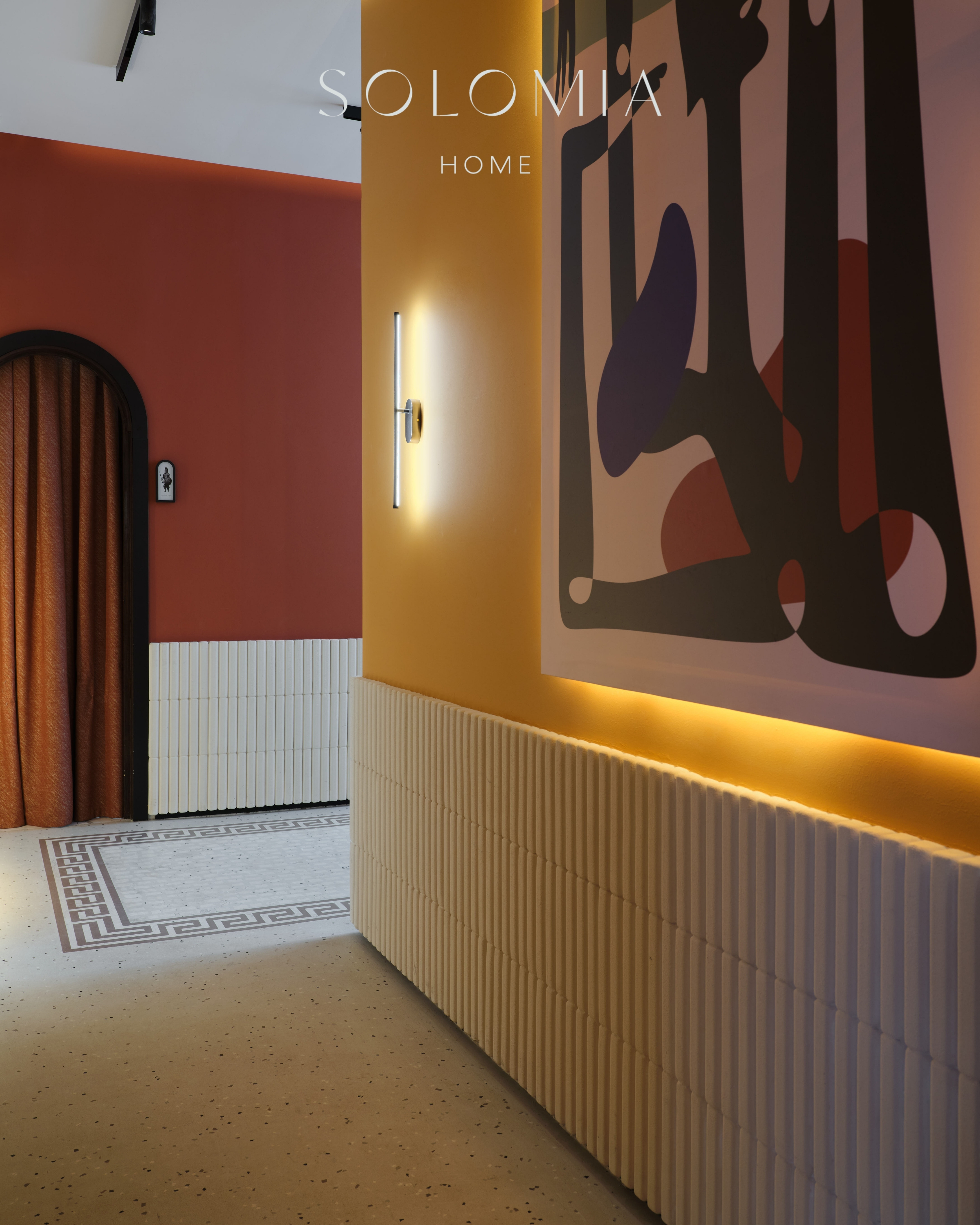 Corridor with abstract artwork and terracotta wall, Restaurant Dio Grand Cafe — restaurant interior design Astana