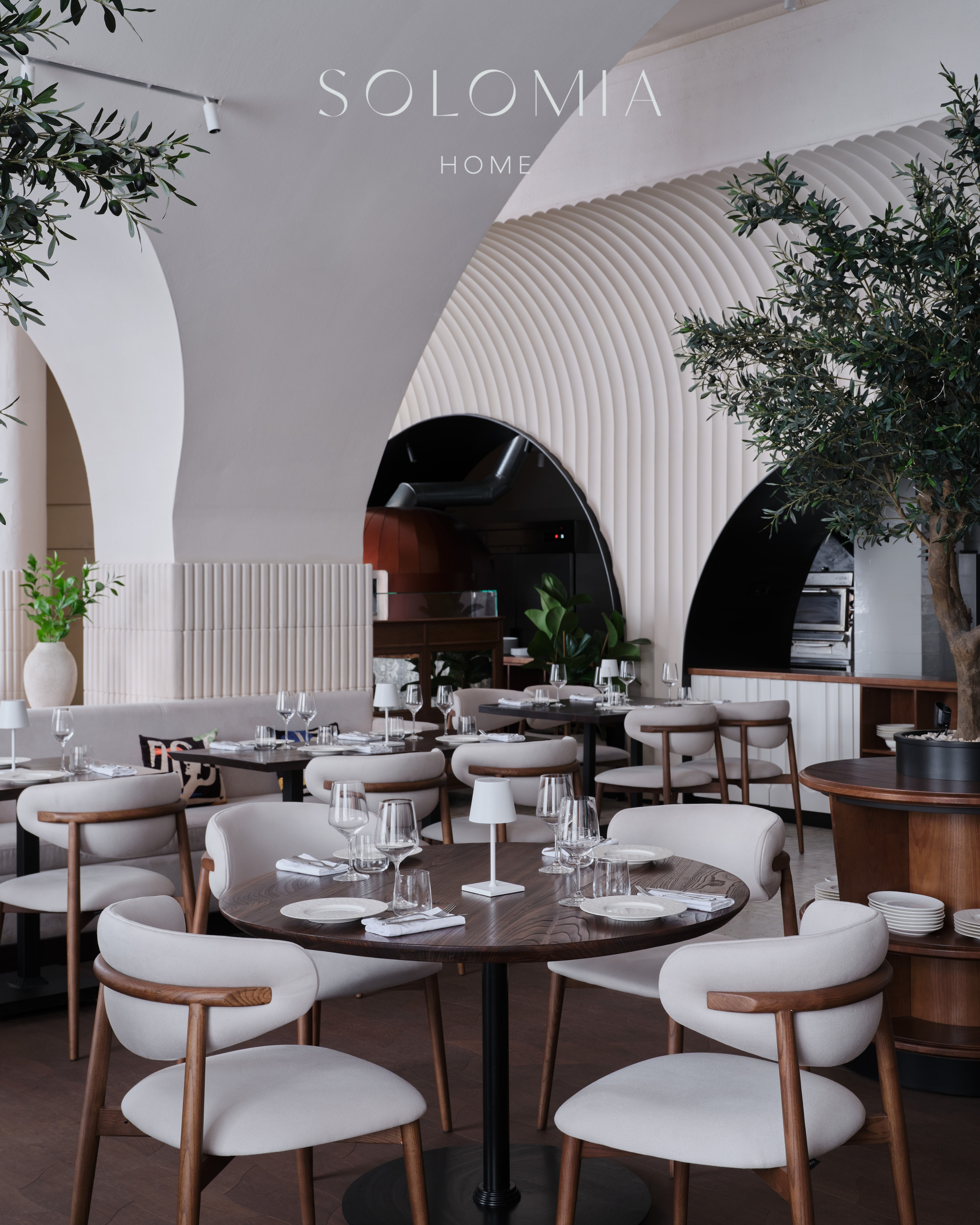 Restaurant hall with tables and olive tree, Restaurant Dio Grand Cafe — restaurant interior design Astana