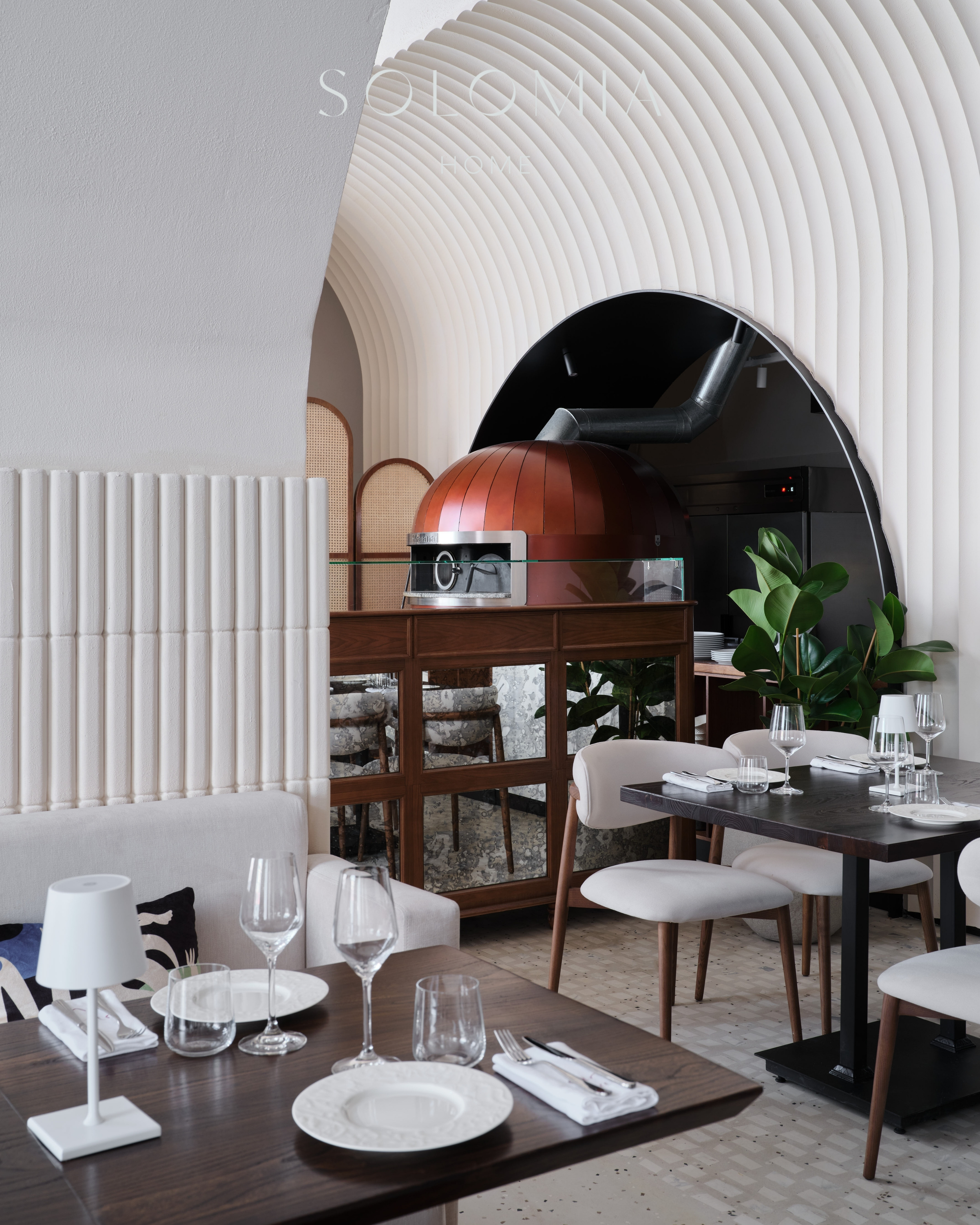 Dining tables by the pizza oven, Restaurant Dio Grand Cafe — restaurant interior design Astana