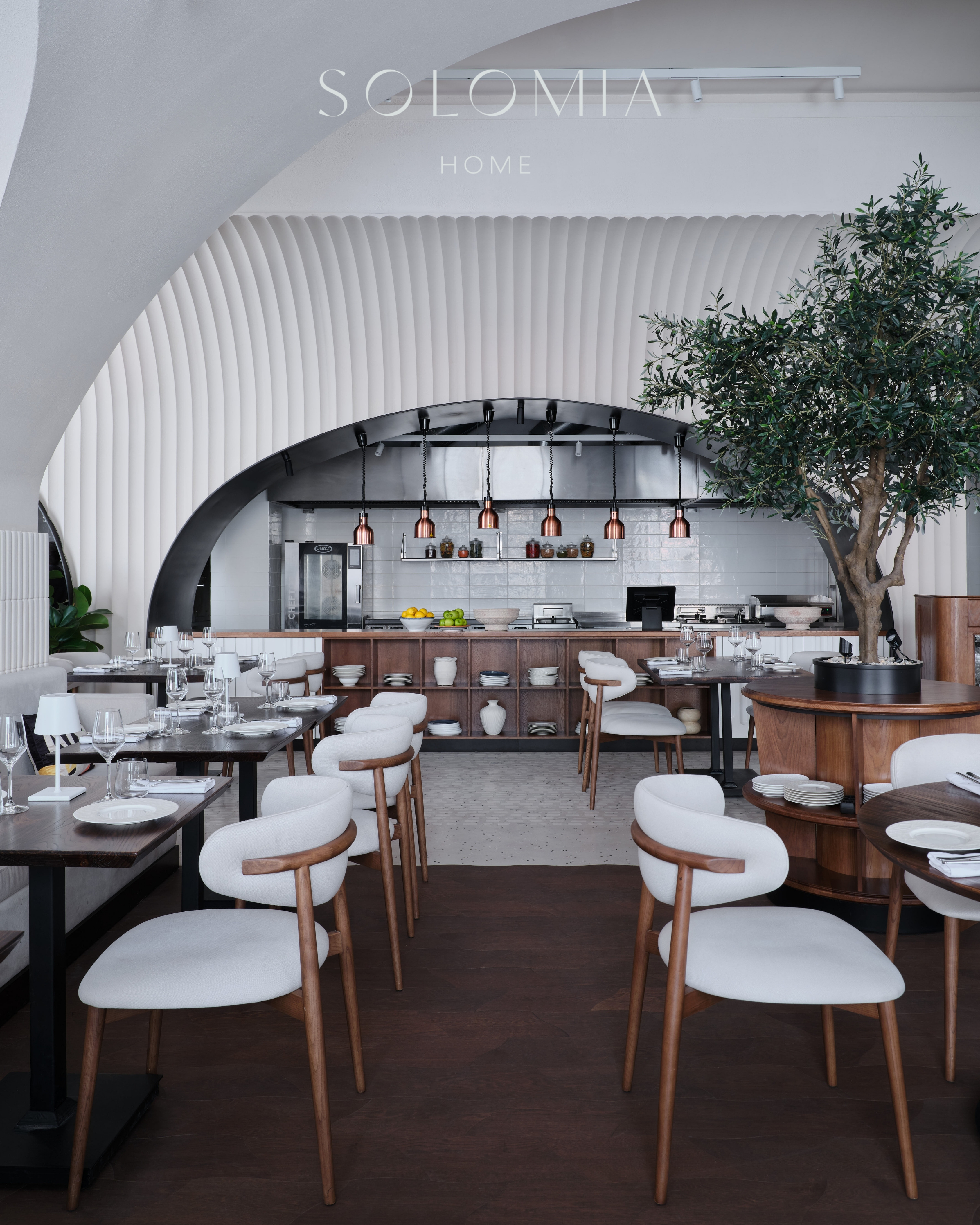 Restaurant hall with white chairs and olive tree, Restaurant Dio Grand Cafe — restaurant interior design Astana