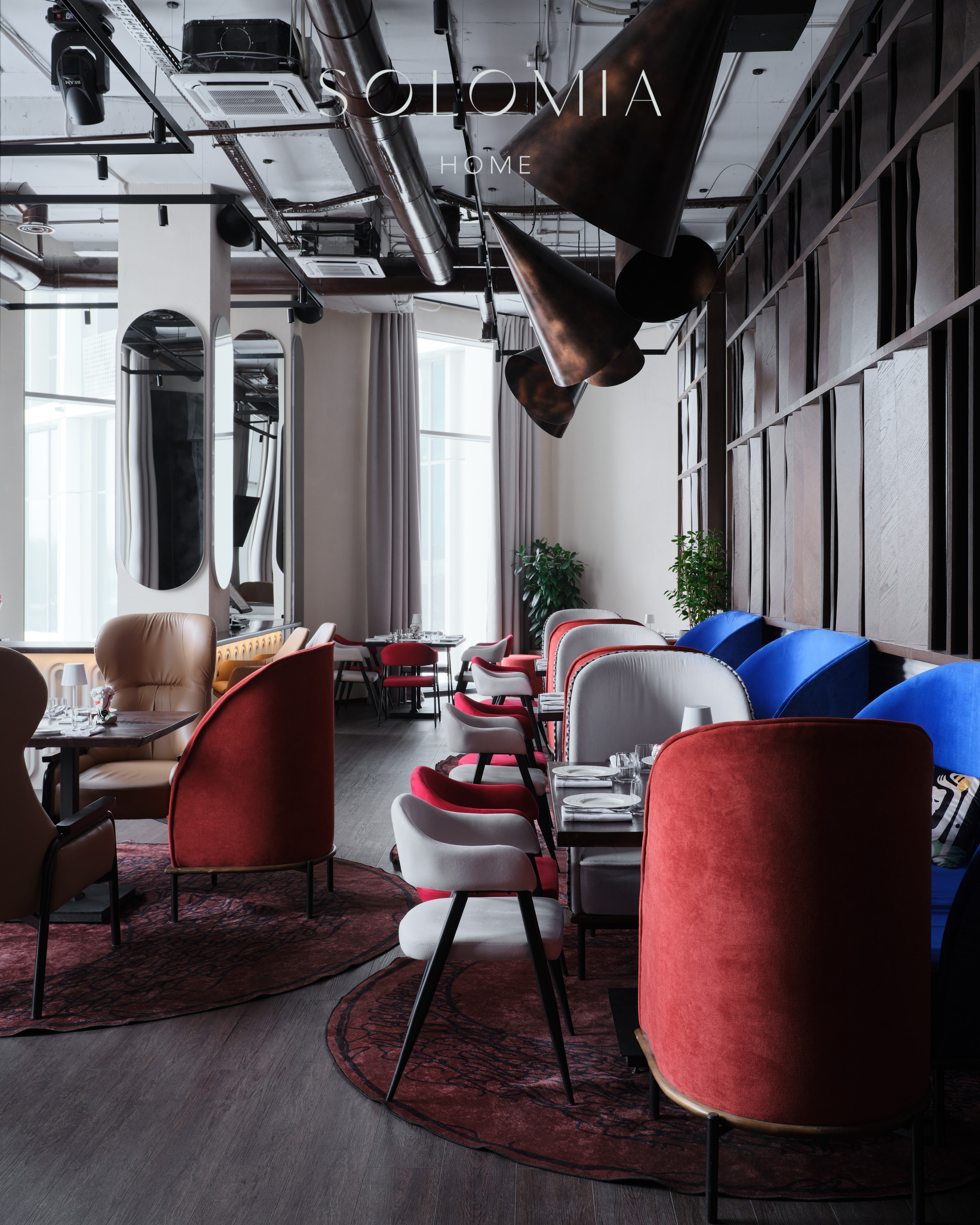 Dining hall with blue and red seating, Restaurant Dio Grand Cafe — restaurant interior design Astana