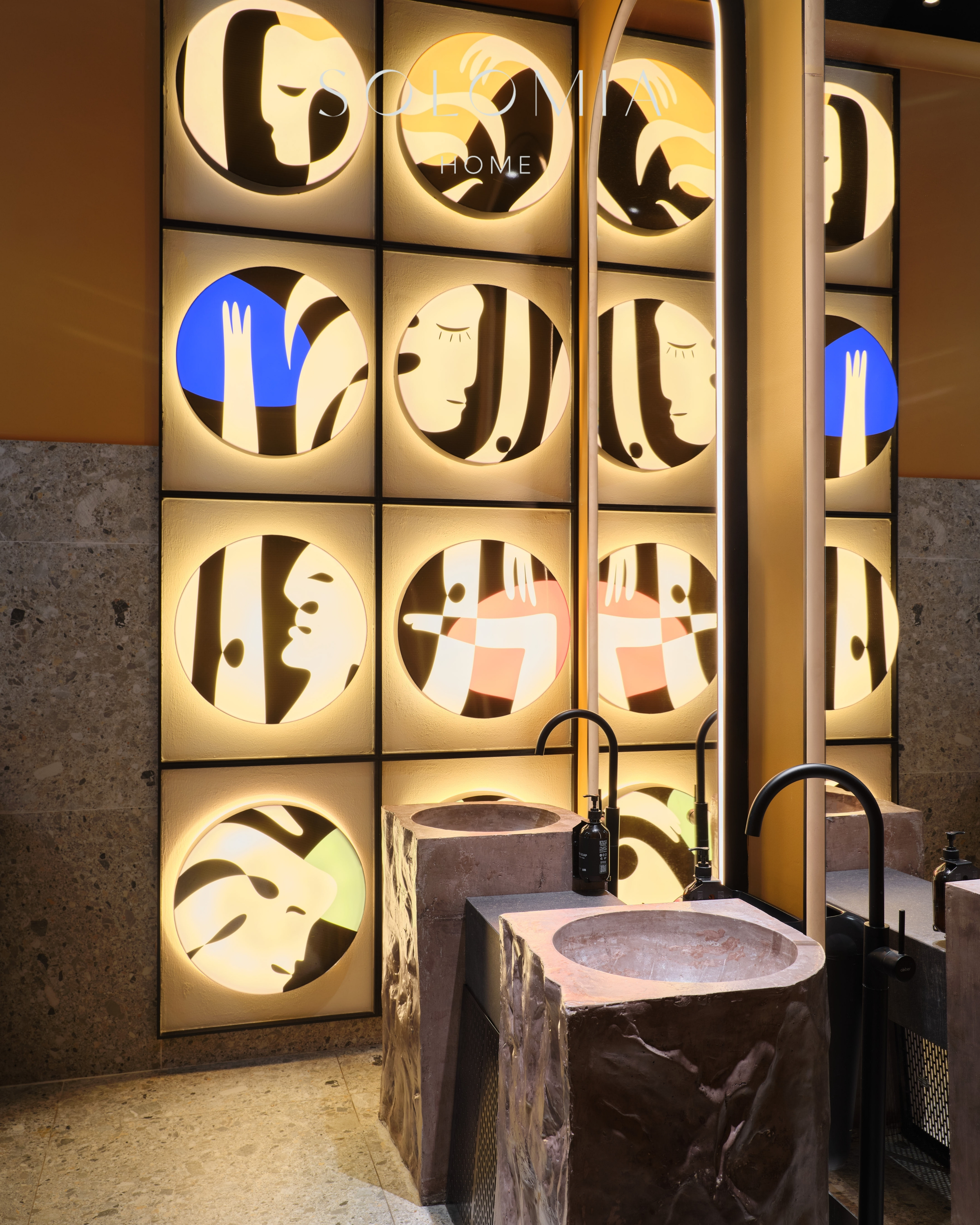 Restroom with illuminated face panels and stone basins, Restaurant Dio Grand Cafe — restaurant interior design Astana