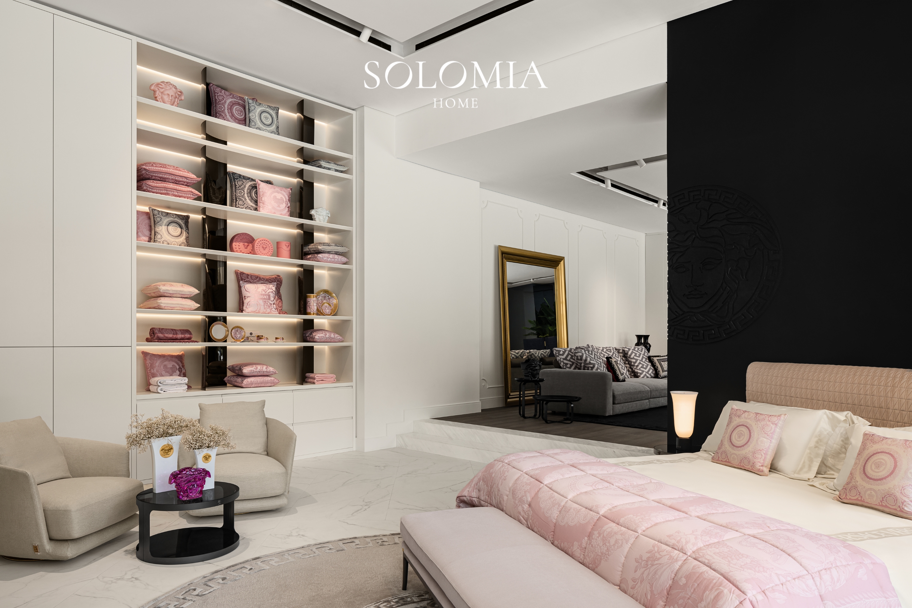 Showroom shelves with Versace cushions and mirror, Versace Home showroom Dubai Mall — commercial interior design by Solomia Design