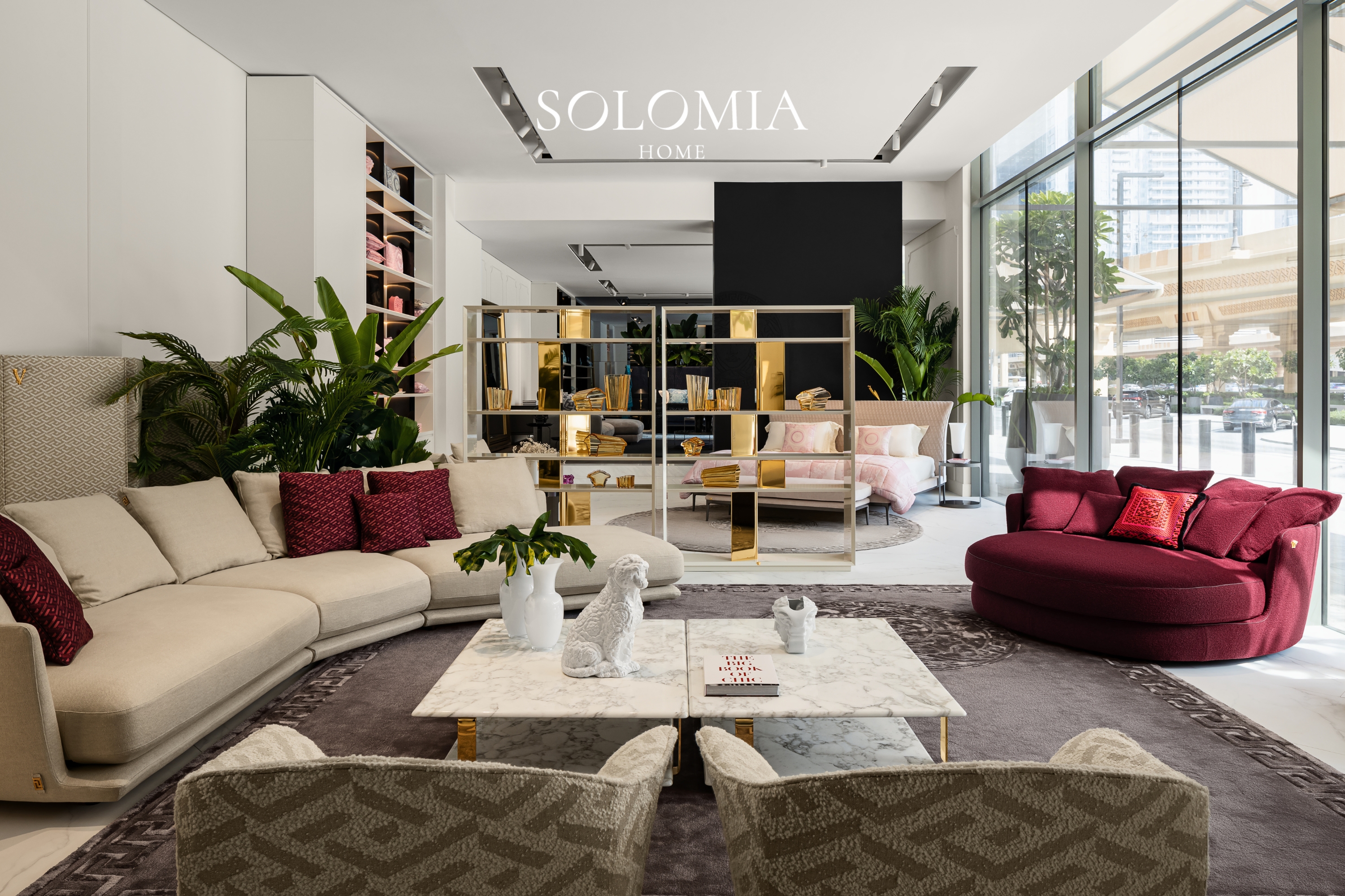 Showroom lounge with red sofa, Versace Home showroom Dubai Mall — commercial interior design by Solomia Design
