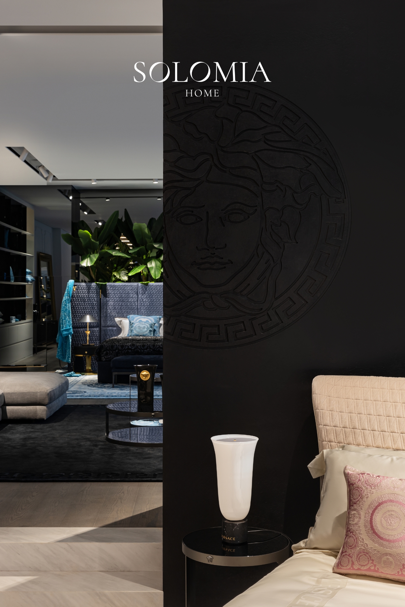 Medusa relief on a black wall, Solomia Design. Dubai — showroom interior design Dubai