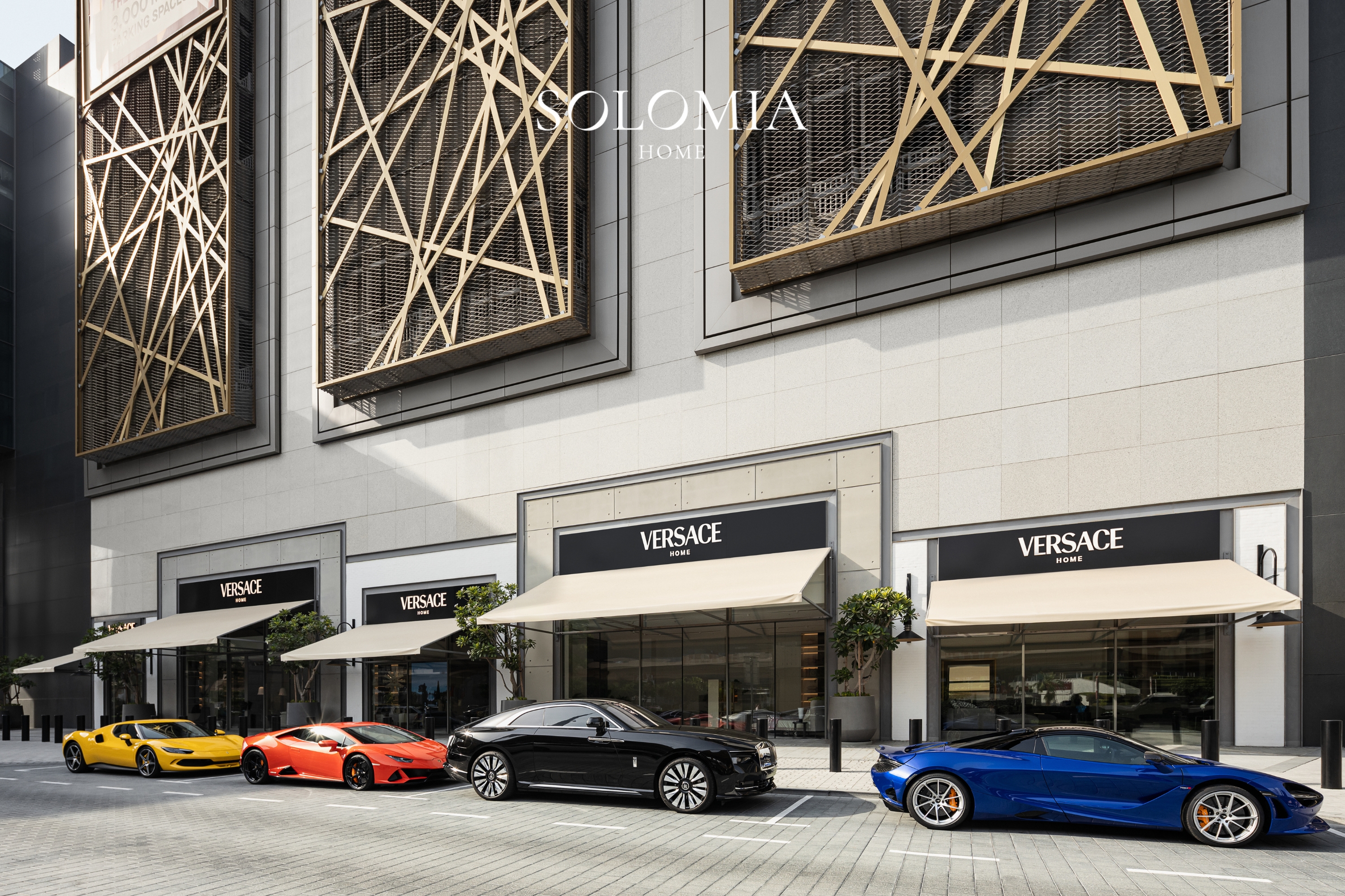 Versace Home store front with sports cars, Versace Home showroom Dubai Mall — commercial interior design by Solomia Design