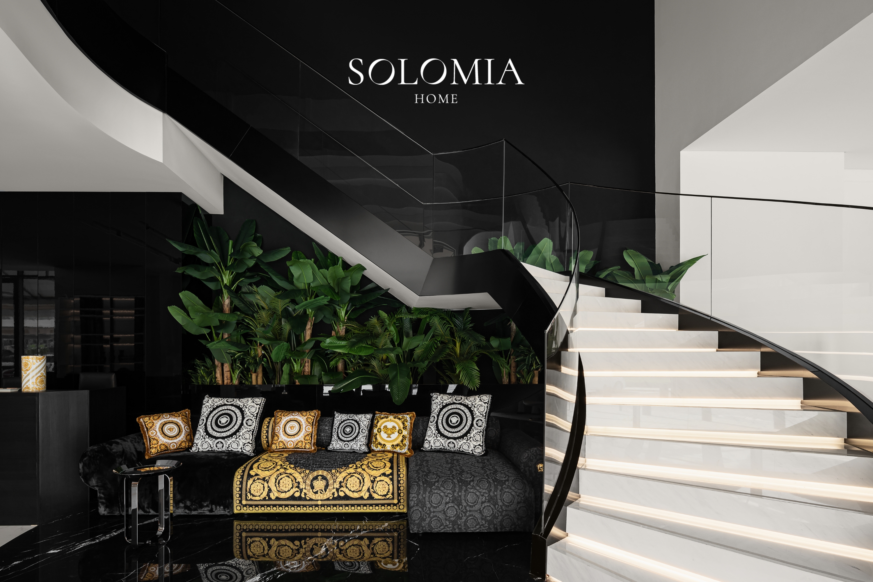 Black staircase with Versace cushions, Solomia Design. Dubai — showroom interior design Dubai